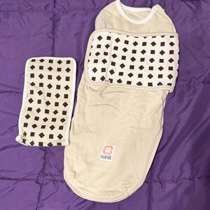 Nanit Cream Baby Swaddle with Black Pattern